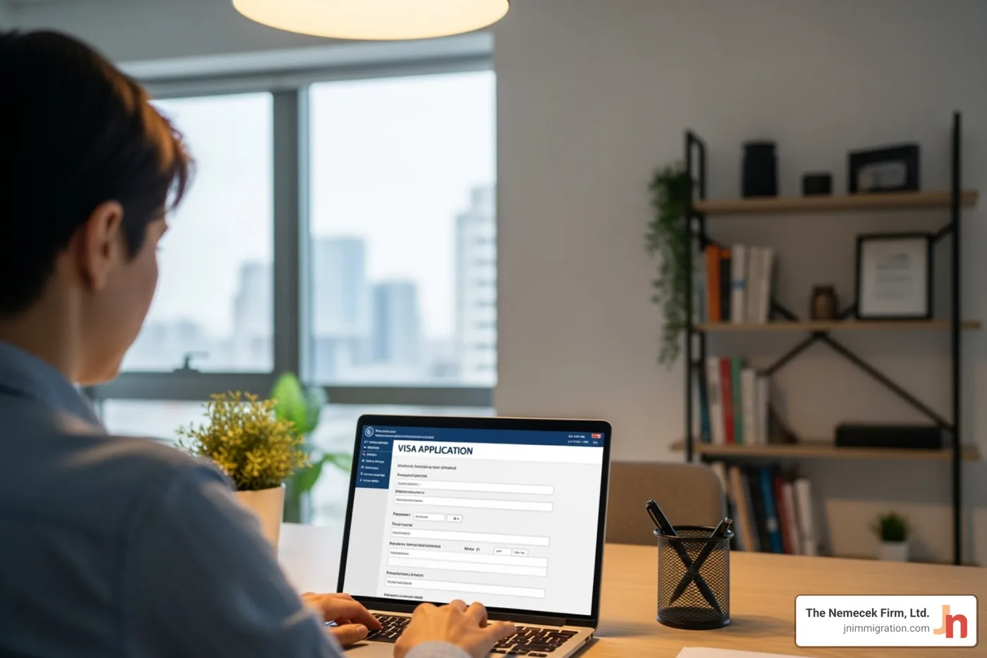 person filling out an online visa application form - Non-immigrant visa lawyer person filling out an online visa application form - Non-immigrant visa lawyer