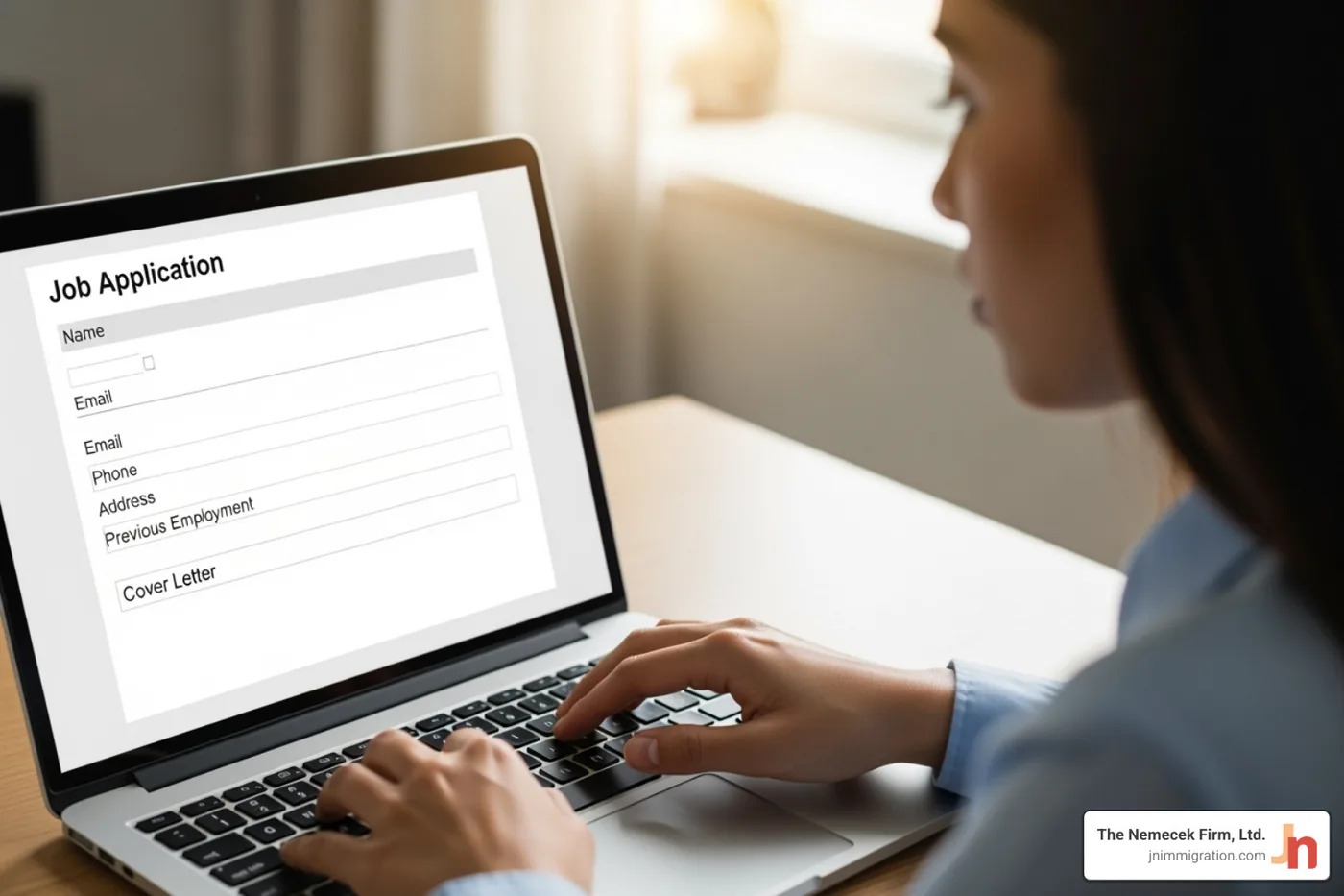 person filling out an online application form on a laptop - US visa application help