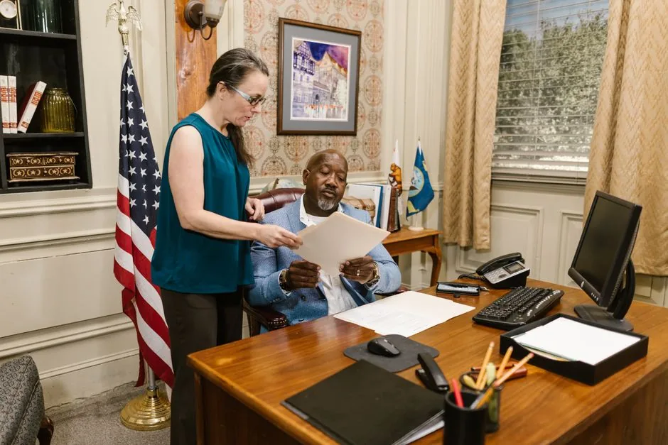 Immigration attorney reviewing documents with client - Columbus immigration lawyer