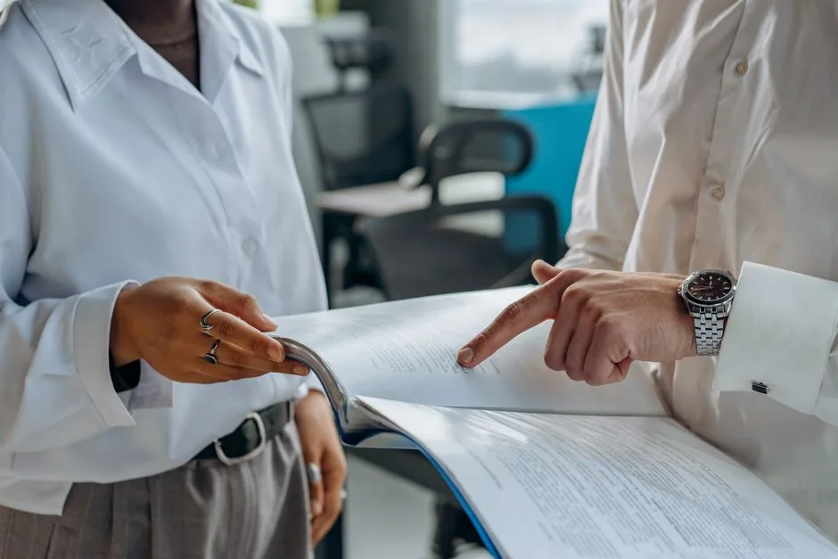 Business professionals reviewing immigration documents - Columbus immigration lawyer