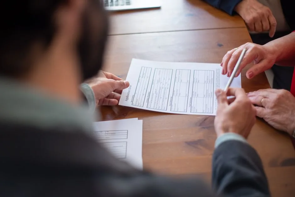 Immigration attorney reviewing a client Form I-360 evidence portfolio Immigration attorney reviewing a client Form I-360 evidence portfolio