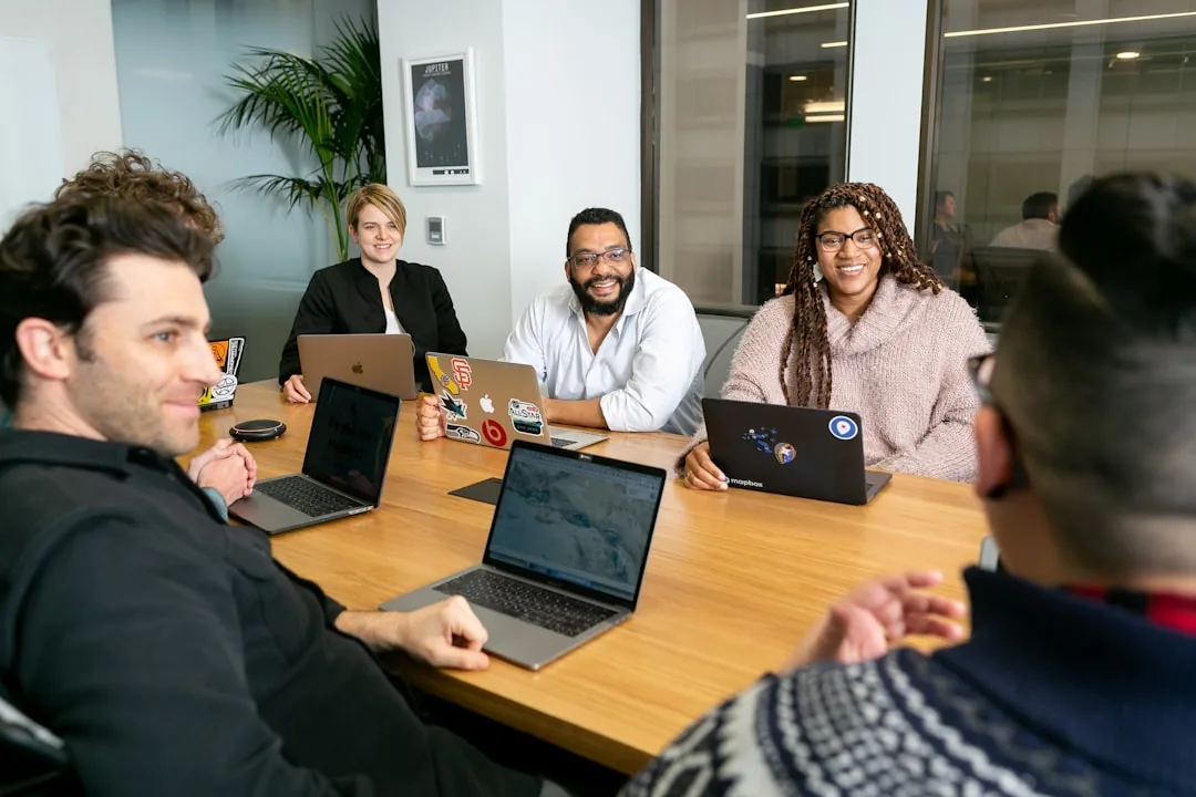 diverse group of professionals collaborating in a modern office setting - immigration lawyer employment-based diverse group of professionals collaborating in a modern office setting - immigration lawyer employment-based