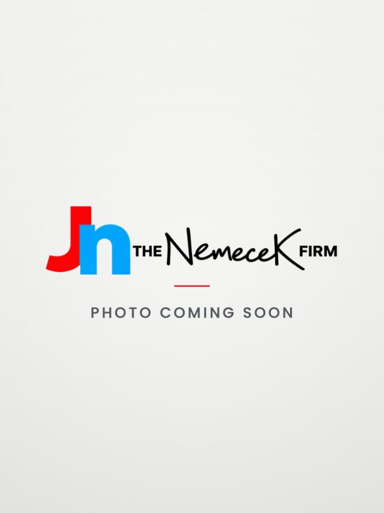 Eugénie Motais, immigration attorney at The Nemecek Firm. Photo coming soon.